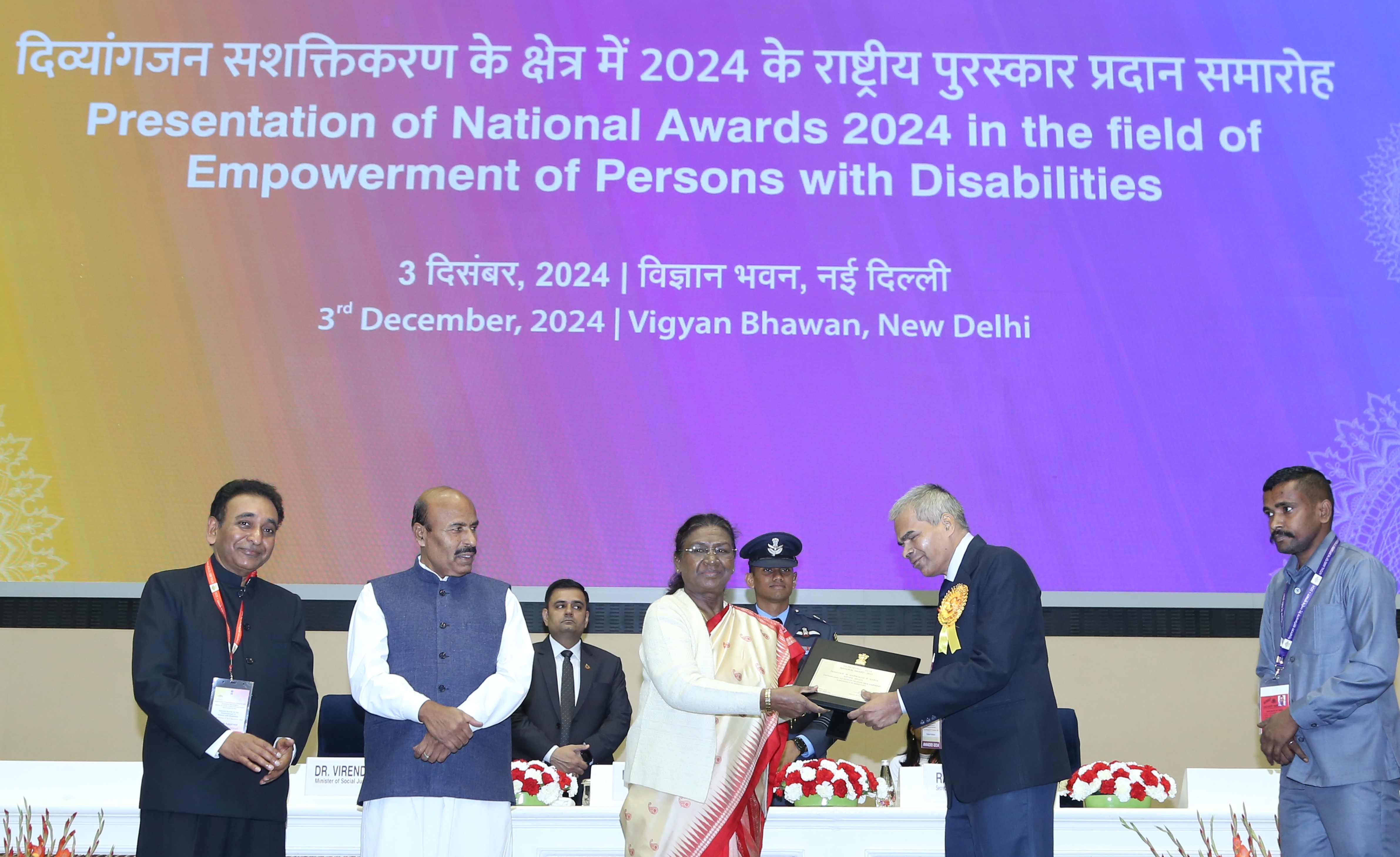 XRCVC receveing National Award from president Smt. Droupadi Murmu by Ketan Kothari on stage, the presence of Union Minister for Social Justice and Empowerment, Dr. Virendra Kumar and Secretary of the Department of Empowerment of Persons with Disabilities (DEPwD) Shri Rajesh Aggarwal.